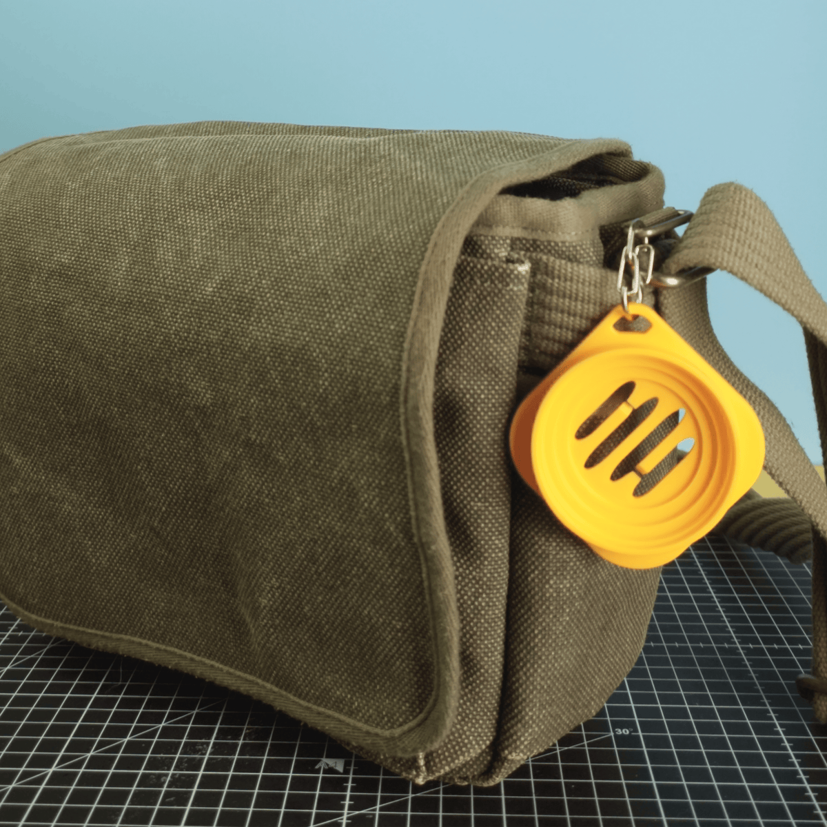 CAPS-lock — Porta copriobiettivo per borsa, zaino e cintura - Bledoforma