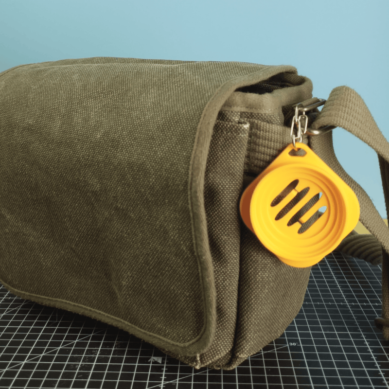 CAPS-lock — Porta copriobiettivo per borsa, zaino e cintura - Bledoforma